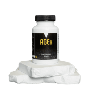 A bottle of pills sitting on top of some white rocks.