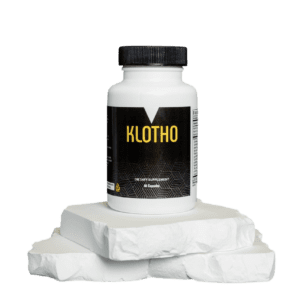 A bottle of supplement sitting on top of some white paper.